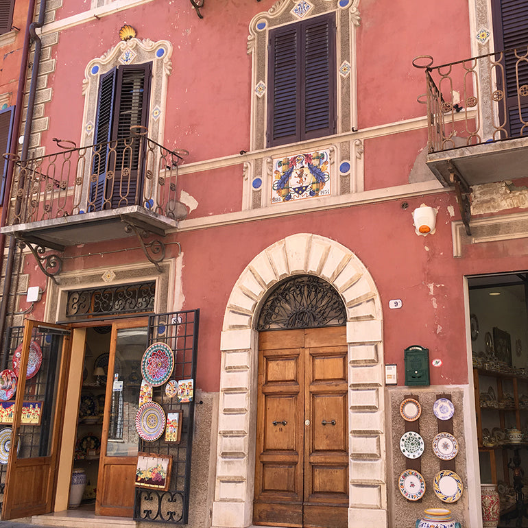 The front of a pottery workshop in Italy