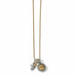 Brighton charm necklace with two-tone heart, crystal spacer, and 2023 medallion pendants on a white background