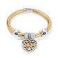 Brighton charm bracelet in gold leather with silver beads and two-tone 2024 heart charm on a white background
