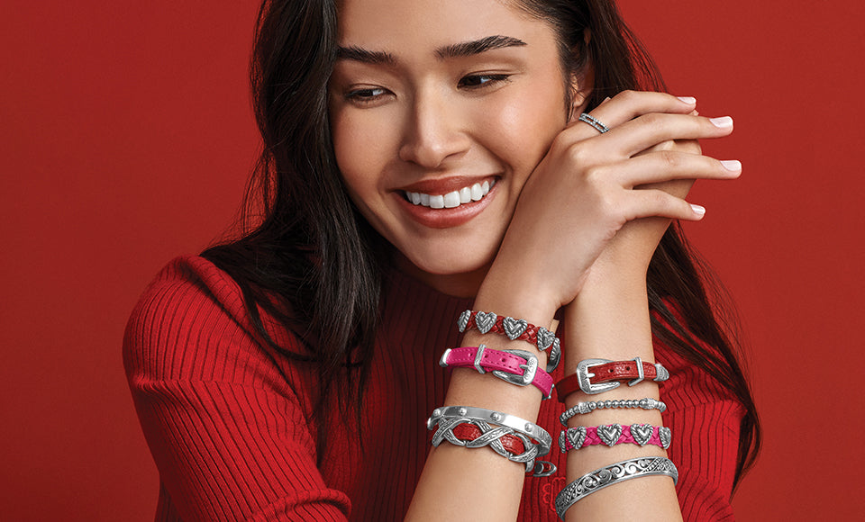 woman wearing stacked bracelets