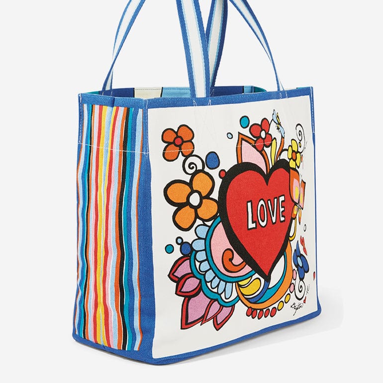 An angled shot of the Power Of Love tote showing the side and back of the bag