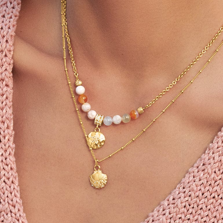 Model wearing Sunset Cove Necklaces