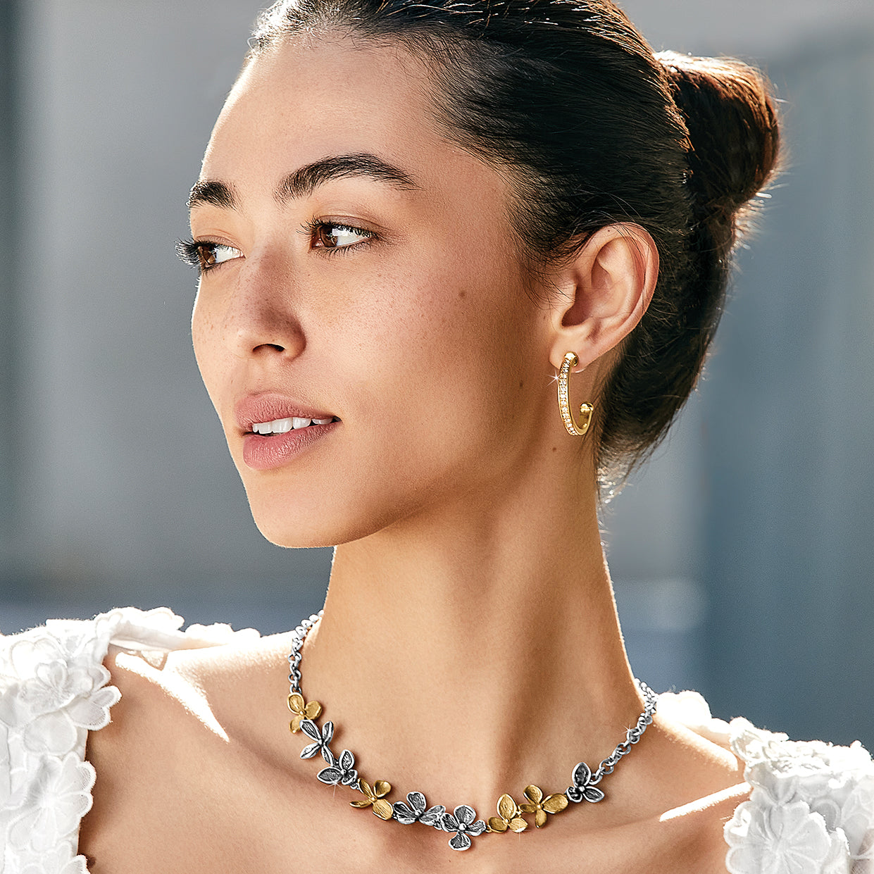 Model wearing Everbloom necklace