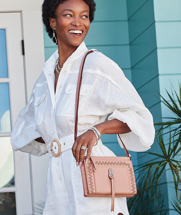 A model wearing Interlok handbag