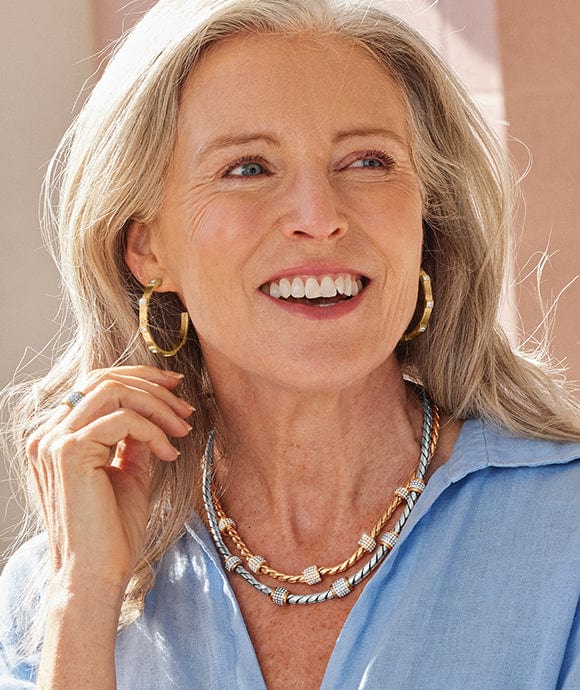 A model wearing Meridian jewelry