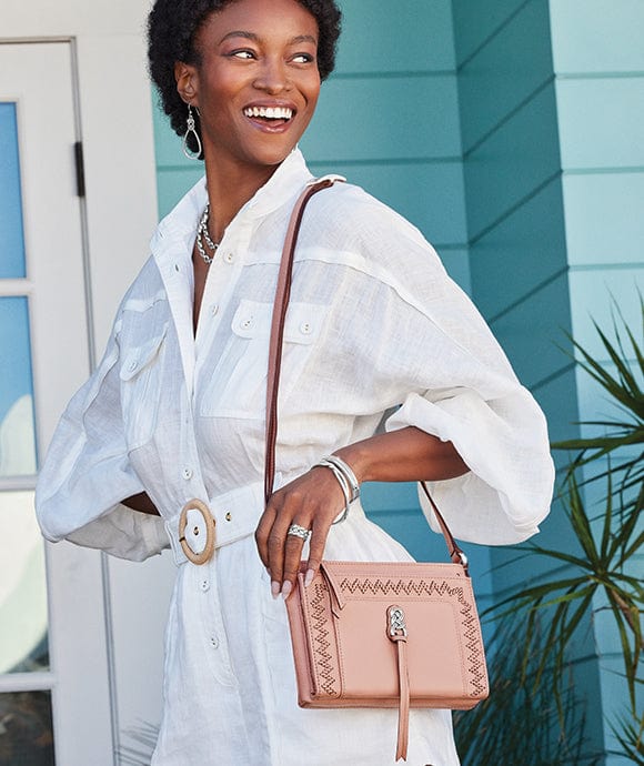 A model wearing Interlok handbag