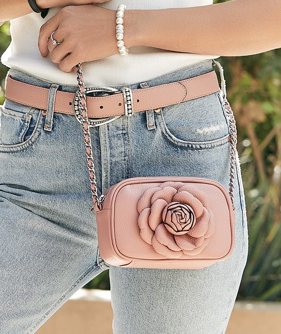 A model wearing a Rosie handbag