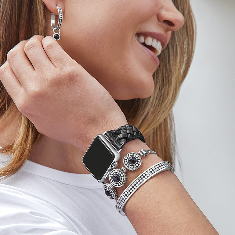 Model wearing Black watch band with Pebble bracelets