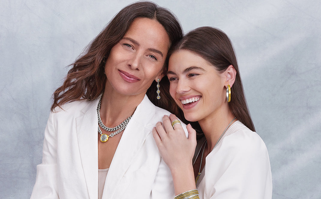 Two women wearing Ferrara jewelry