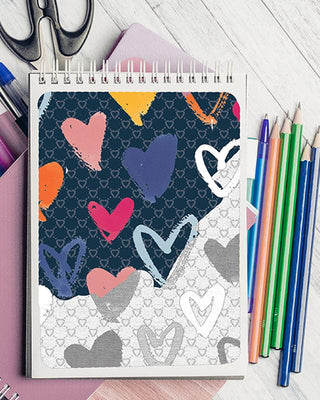 A sketchbook featuring the artwork of the scarf