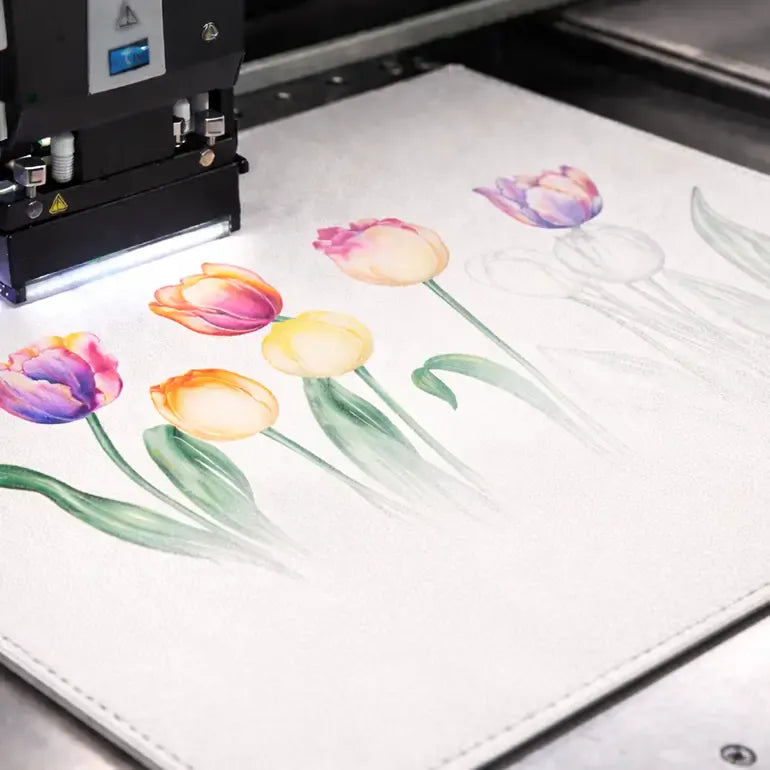 printer creating a colorful tulip design on a white surface.