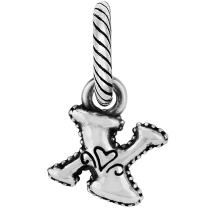 Brighton letter X charm with silver-plated beaded edges, scroll heart detail, and twisted bail on a white background