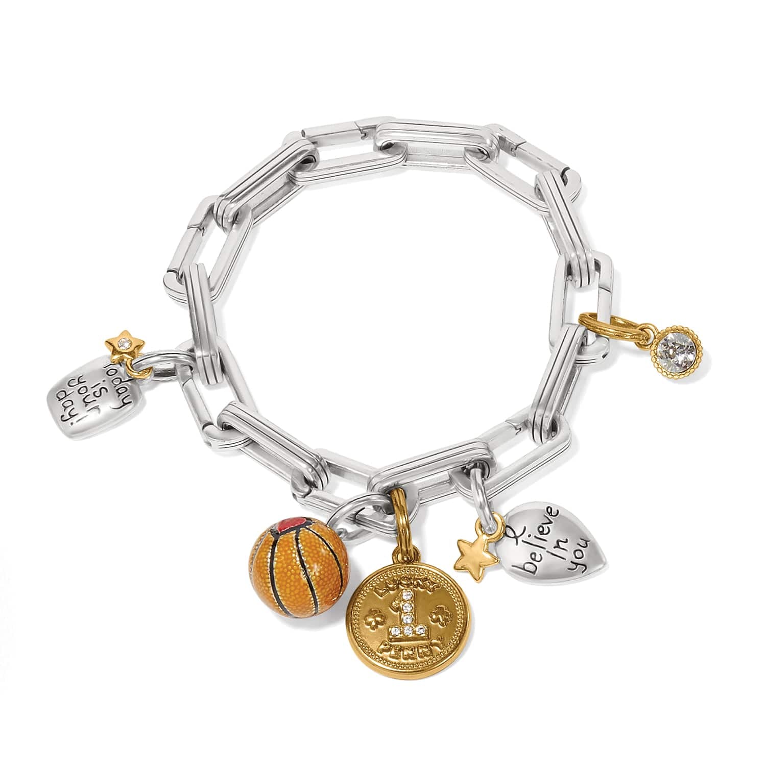 Brighton silver-plated charm bracelet with basketball, gold coin, heart, and crystal charms on a white background