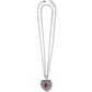 Brighton silver-plated pendant necklace with crystal pavé heart and red center stone on a white background