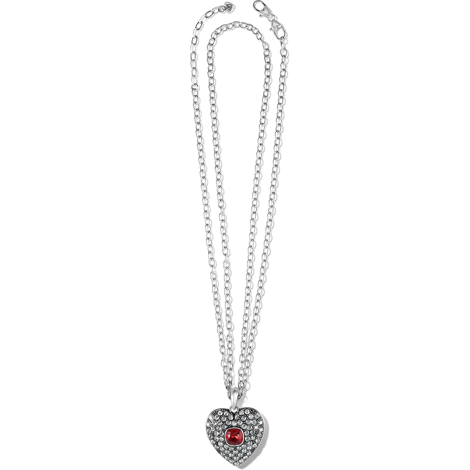 Brighton silver-plated pendant necklace with crystal pavé heart and red center stone on a white background