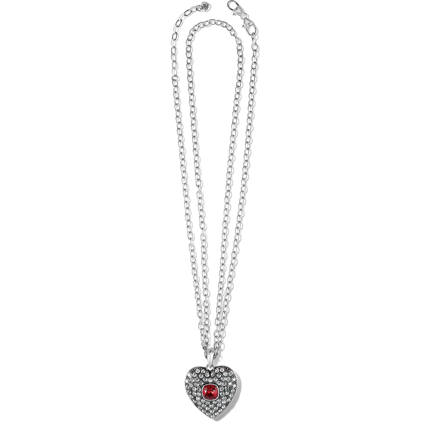 Brighton silver-plated pendant necklace with crystal pavé heart and red center stone on a white background