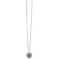 Brighton pendant necklace with silver-plated heart featuring red crystal center and textured dot pattern on a white background