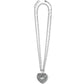 Brighton silver-plated heart pendant necklace with crystal pavé and center faceted crystal stone on a white background