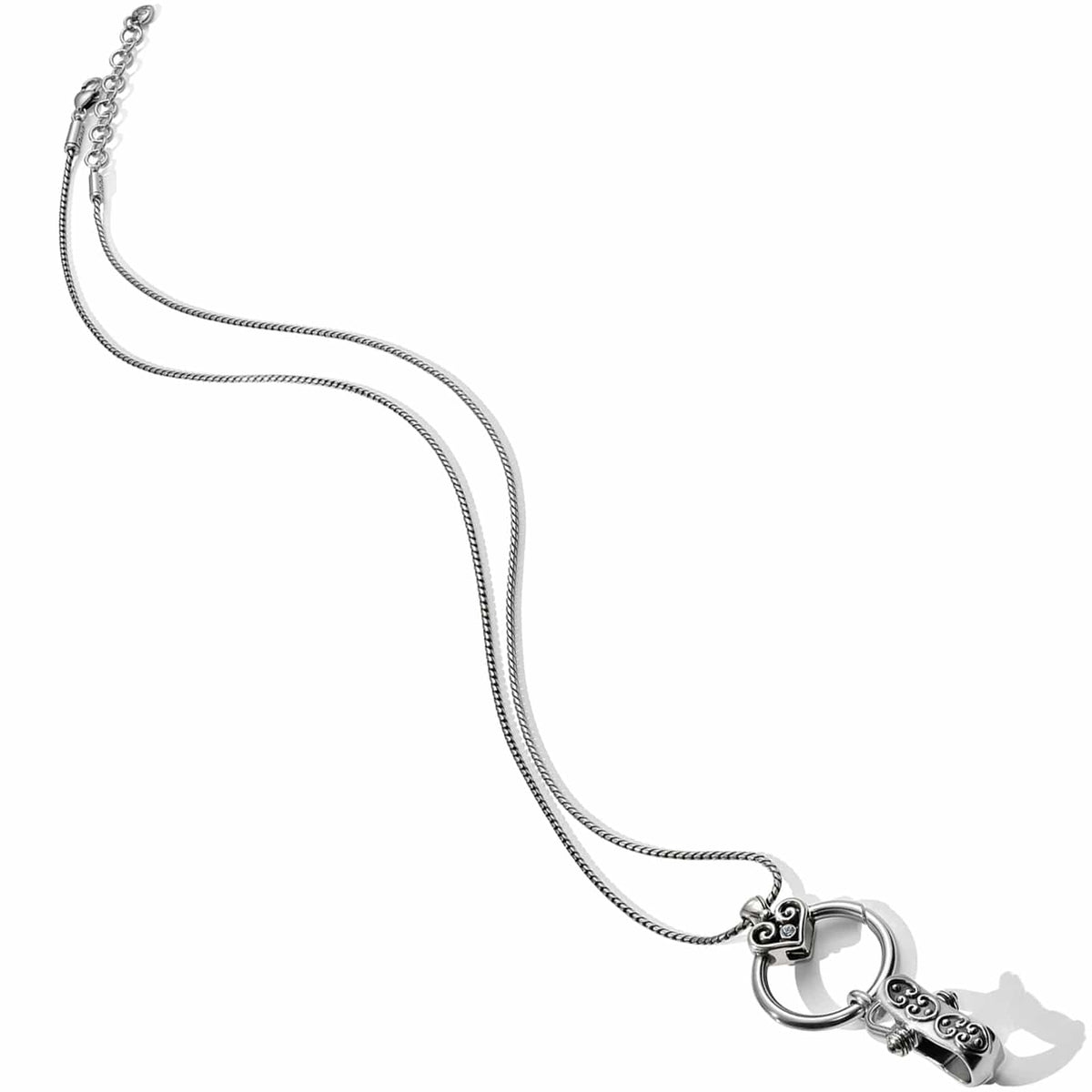Brighton charm holder necklace with silver-plated snake chain and ornate scrollwork ring pendant on a white background