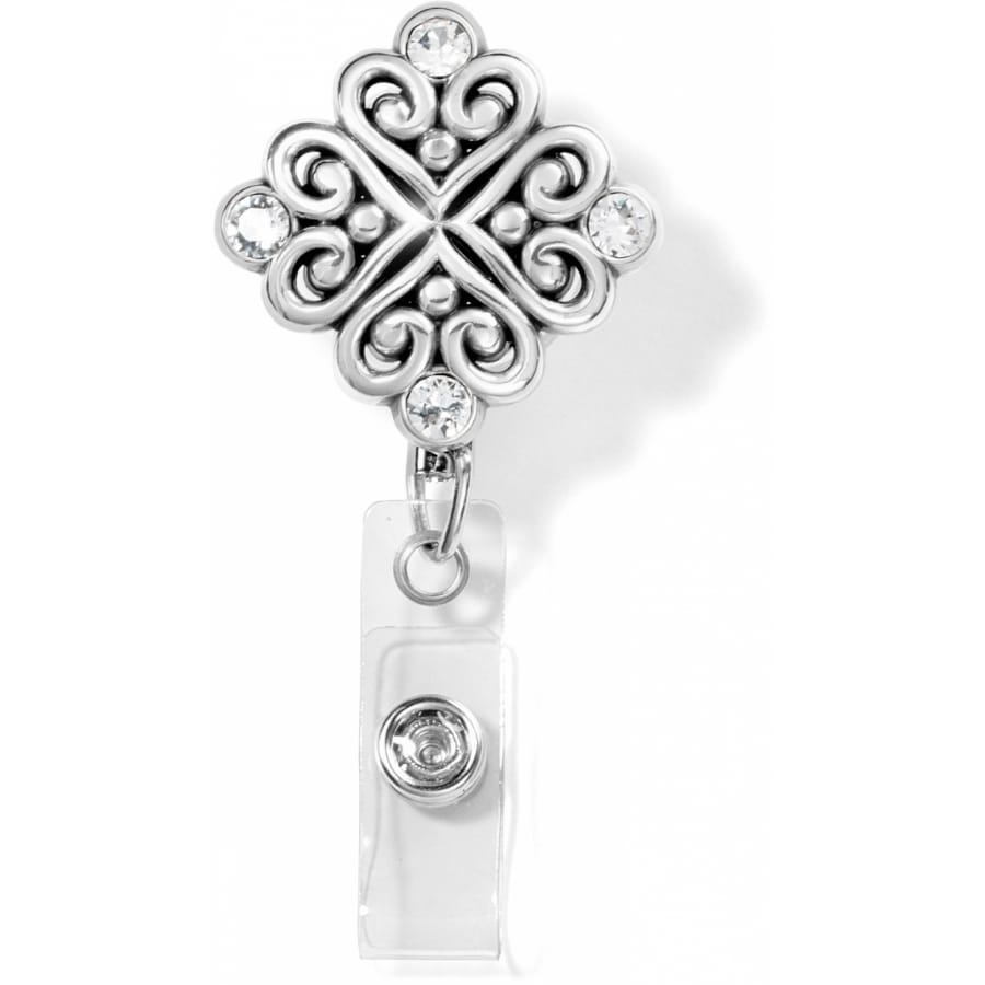 Brighton silver-plated retractable badge reel with ornate scrollwork medallion and crystal accents on a white background