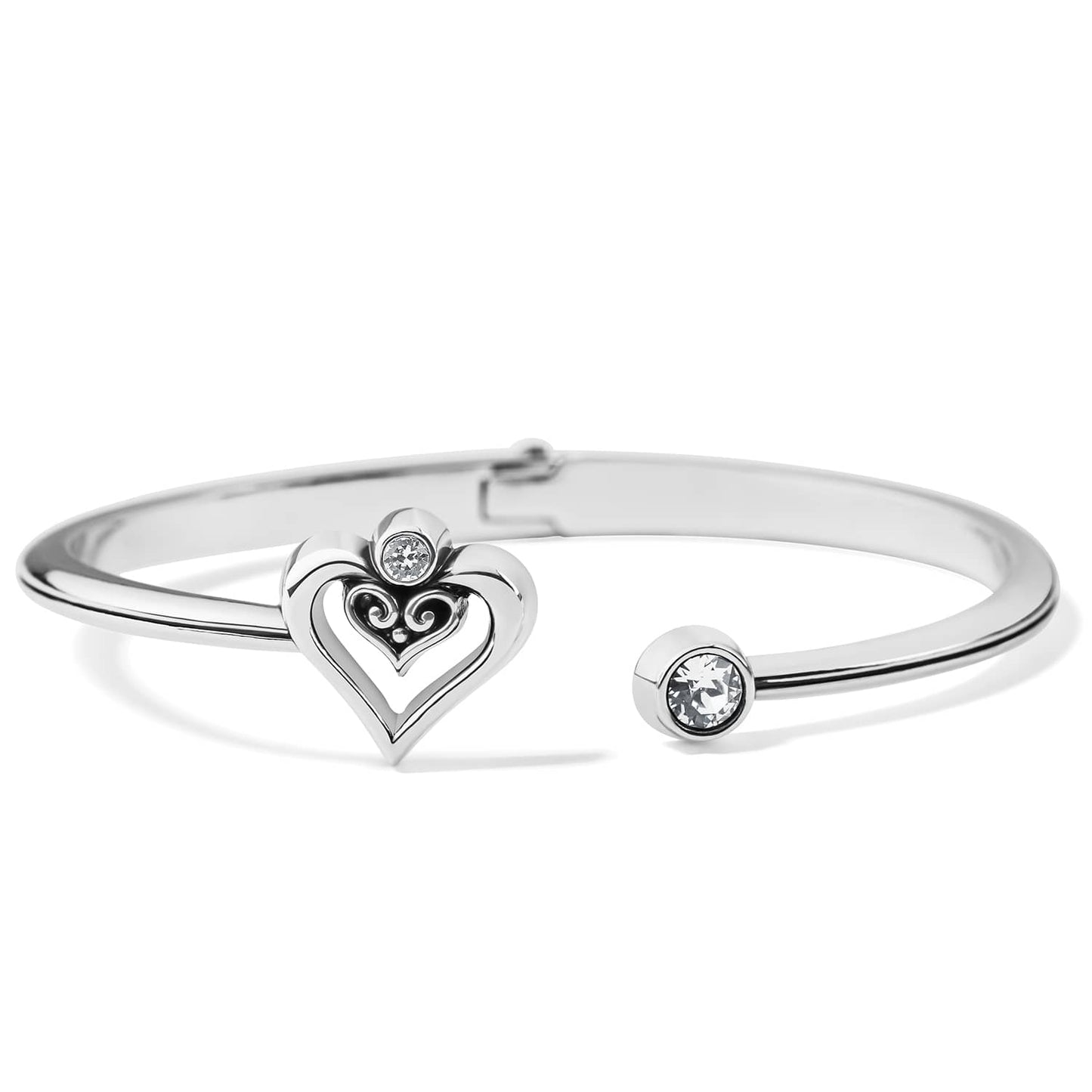 Brighton hinged cuff bracelet with silver-plated heart motif and crystal accents on a white background