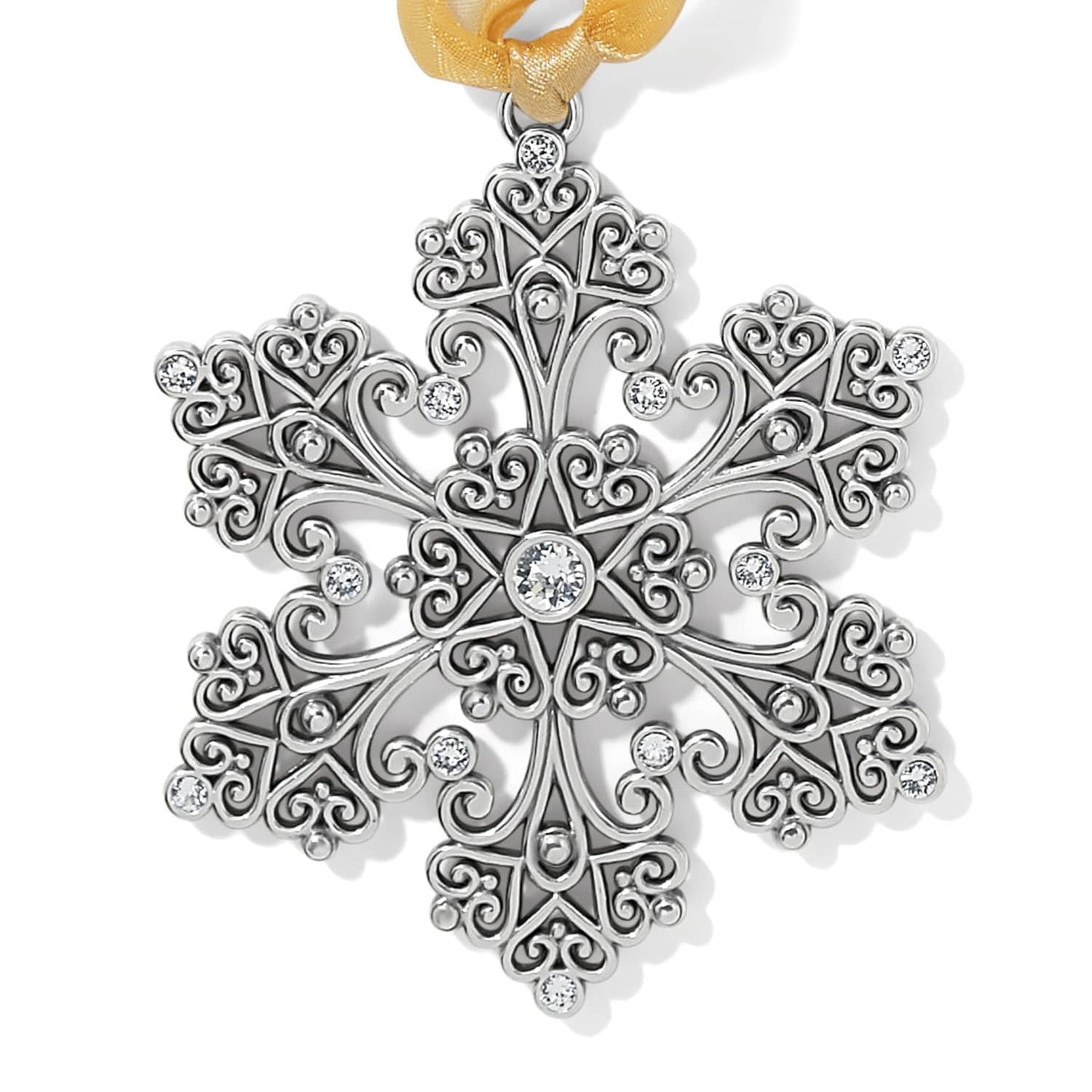 Brighton snowflake ornament with silver-plated filigree scrollwork, crystal accents, and gold ribbon on a white background