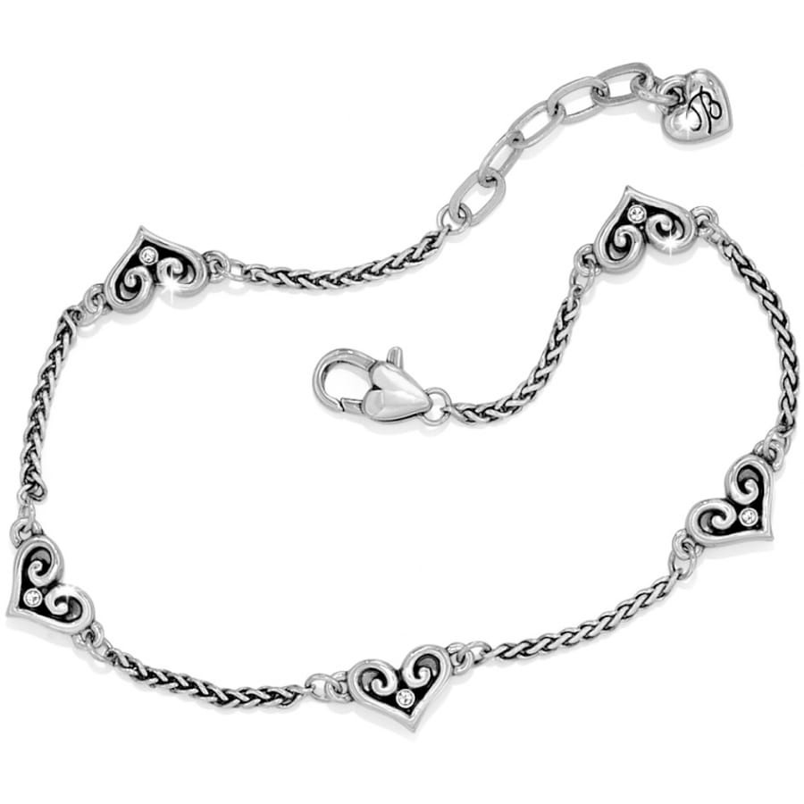 Brighton silver-plated bracelet with scrolled heart stations, crystal accents, and lobster clasp on a white background