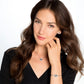 Model wearing a Brighton silver-plated heart pendant necklace with crystal accents and coordinating Brighton accessories