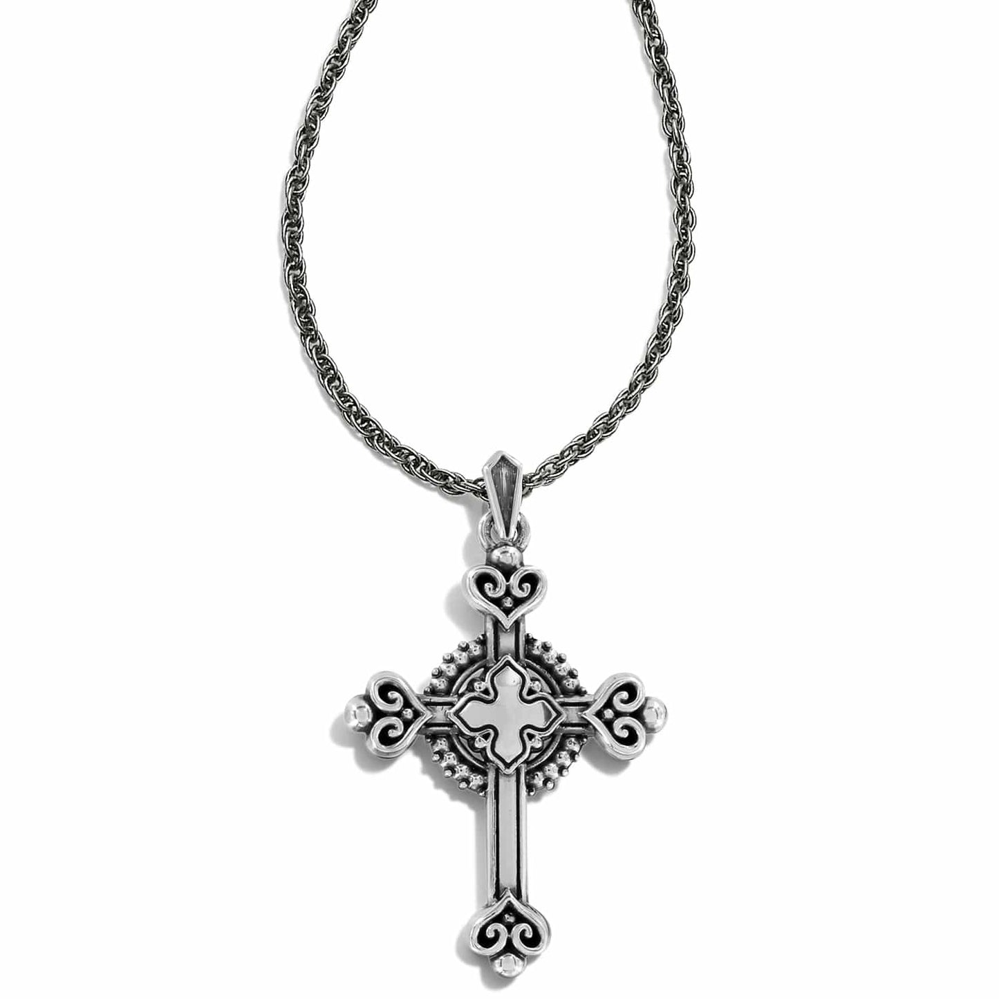 Brighton pendant necklace with silver-plated ornate cross featuring scrollwork and beaded detail on a white background