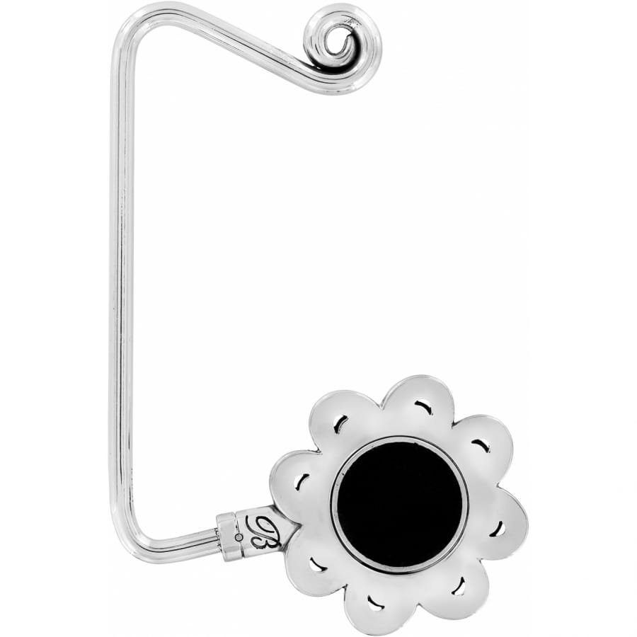 Brighton silver-tone bag hook with scrolled top and black flower-shaped medallion base on a white background
