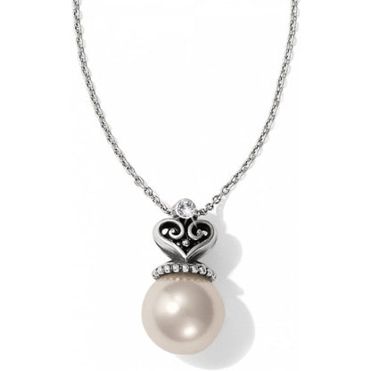 Brighton pendant necklace with large pearl, silver-plated heart filigree, and crystal accent on a white background
