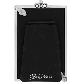 Brighton picture frame shown from the back with silver-plated ornate scroll crest and easel stand on a white background