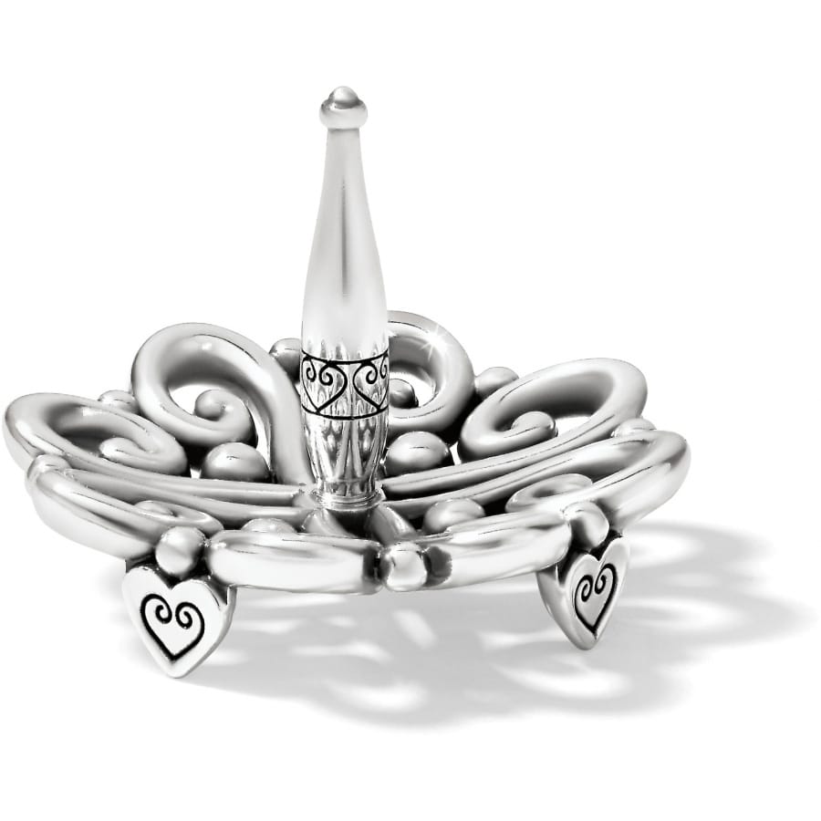 Brighton silver-plated ring holder with scrollwork design, heart-detailed feet, and central post on a white background