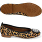 Brighton leopard-print ballet flats with silver-tone medallion ornament, shown with side and sole views on a white background
