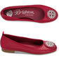 Brighton red leather ballet flats with silver-tone medallion ornament, shown from top and side views, on a white background