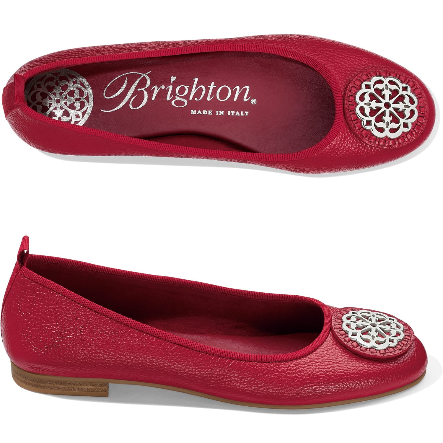 Brighton red leather ballet flats with silver-tone medallion ornament, shown from top and side views, on a white background