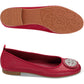Brighton red leather ballet flats with silver-tone medallion ornament, shown alongside sole view on a white background
