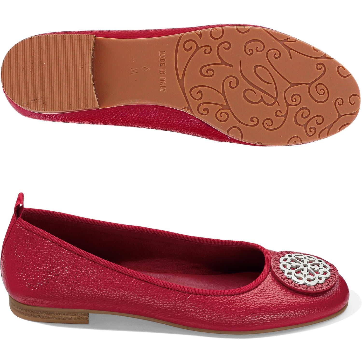 Brighton red leather ballet flats with silver-tone medallion ornament, shown alongside sole view on a white background