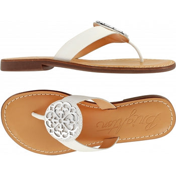 Brighton white thong sandals with silver-tone medallion ornament shown from side and top views on a white background