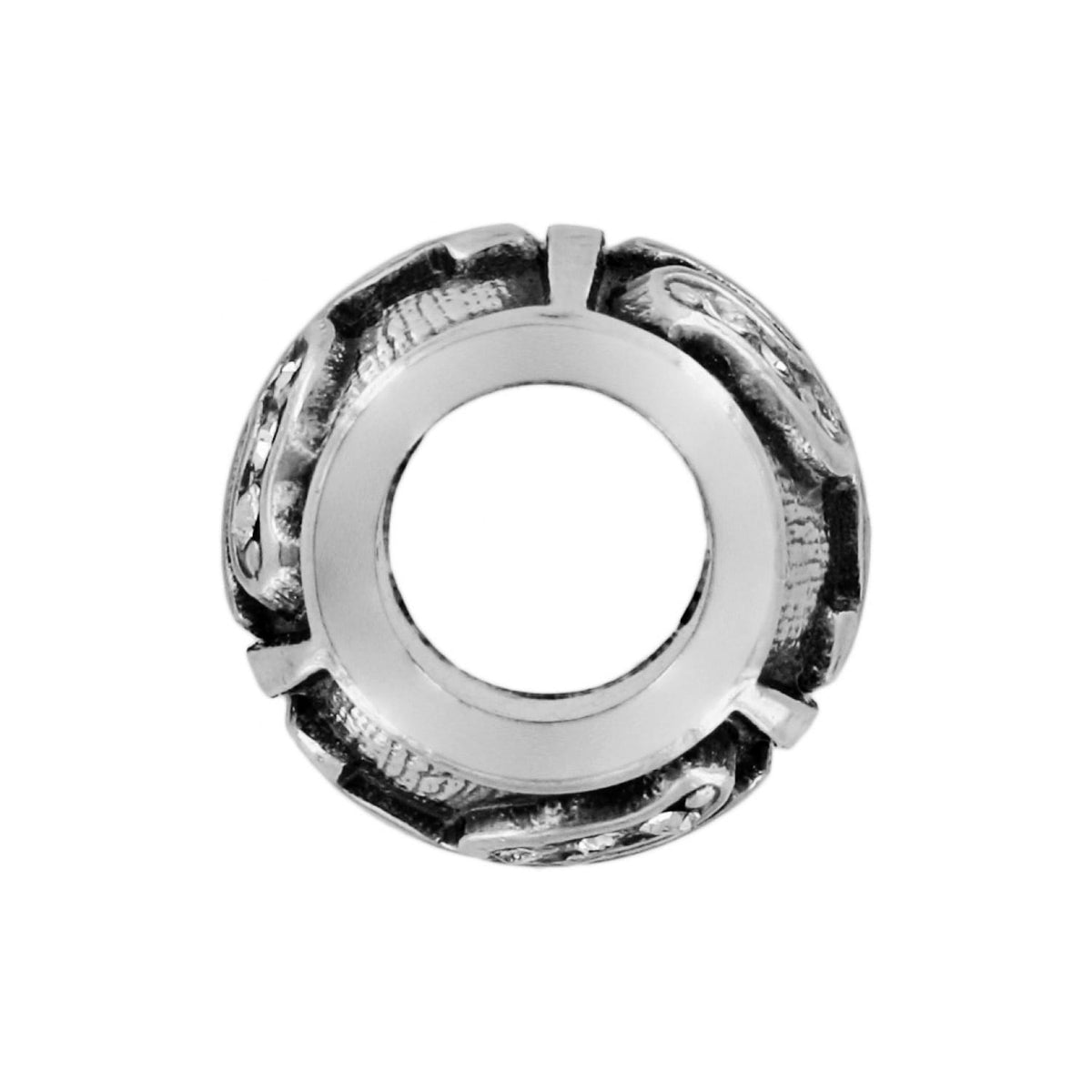 Brighton silver-plated spacer charm with ornate scrollwork and crystal accents around a polished center on a white background