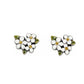 Brighton stud earrings with white enamel flowers, yellow crystal centers, and green leaf accents on a white background