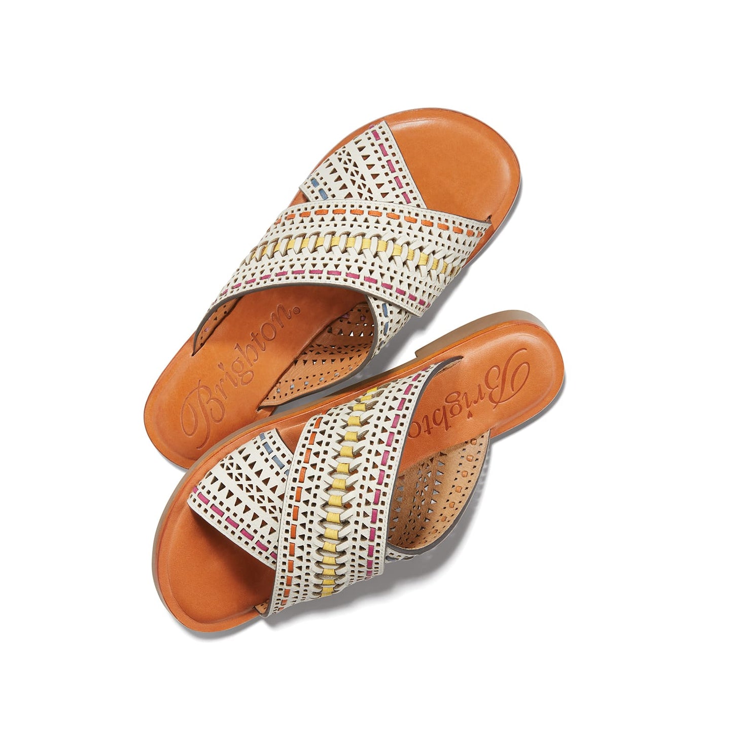 Brighton leather slide sandals with cross straps, laser-cut cutouts, and colorful stitching on a white background