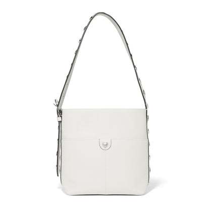 Brighton white pebbled leather shoulder handbag with silver-tone studded strap and heart accent on a white background