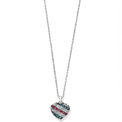 Brighton pendant necklace with silver-plated chain and striped heart charm featuring red, blue, and clear crystals on a white background