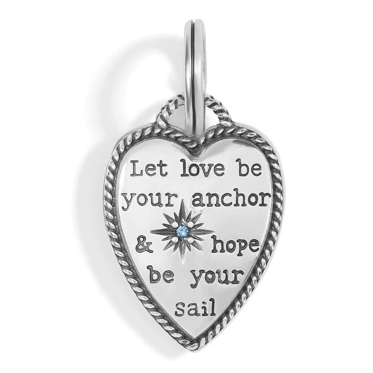 Brighton heart charm with silver-plated rope border, engraved inspirational message, and blue crystal star accent on a white background