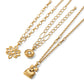 Brighton gold-tone necklaces with scroll pendant, round crystal medallion, and hammered square charm on a white background