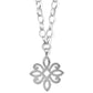 Brighton pendant necklace with silver-plated openwork scroll floral motif and oval link chain on a white background