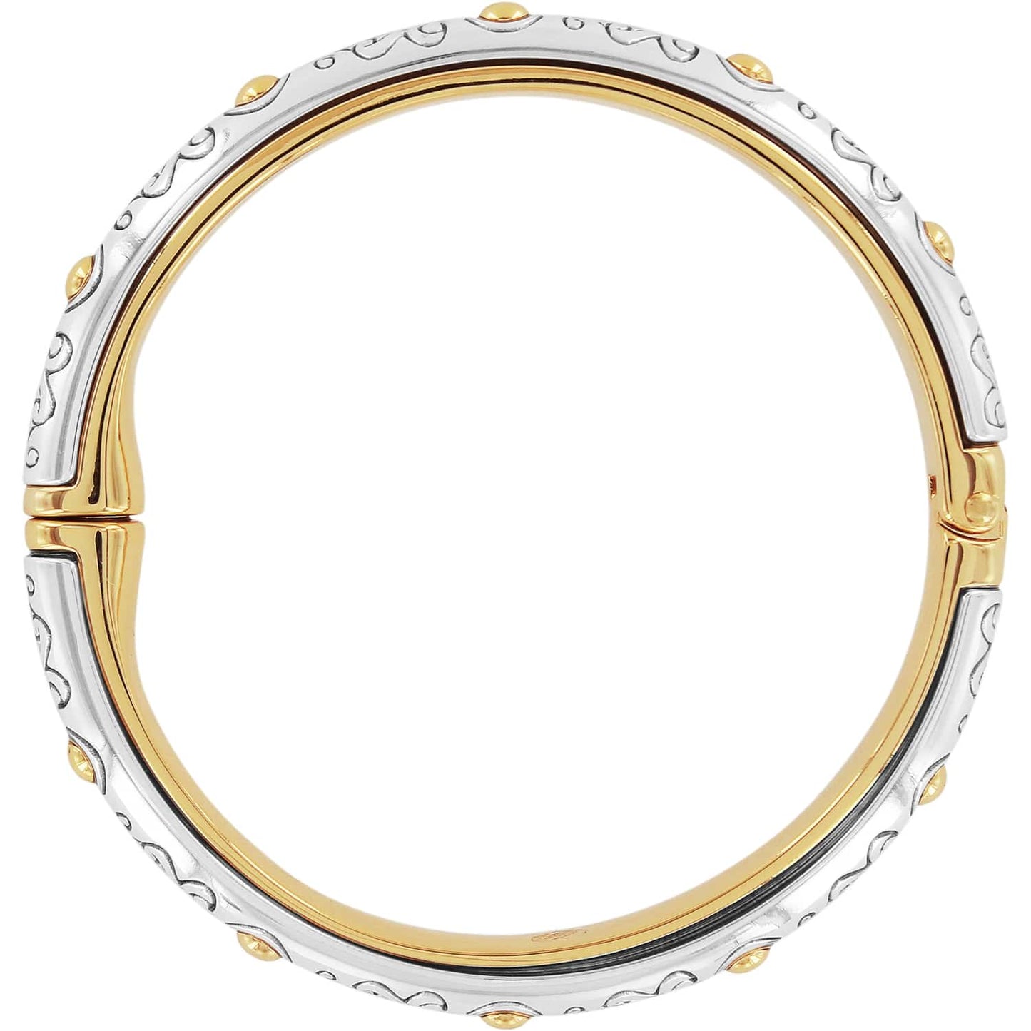 Brighton hinged bangle bracelet shown from the side with silver-plated scroll design and gold-plated studs on a white background