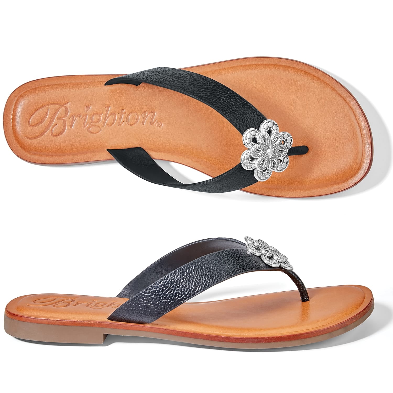 Brighton black leather thong sandals with silver-tone floral medallion accent shown from top and side views on a white background
