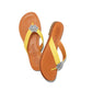 Brighton yellow thong sandals with orange footbed and silver-tone floral medallion accents on a white background